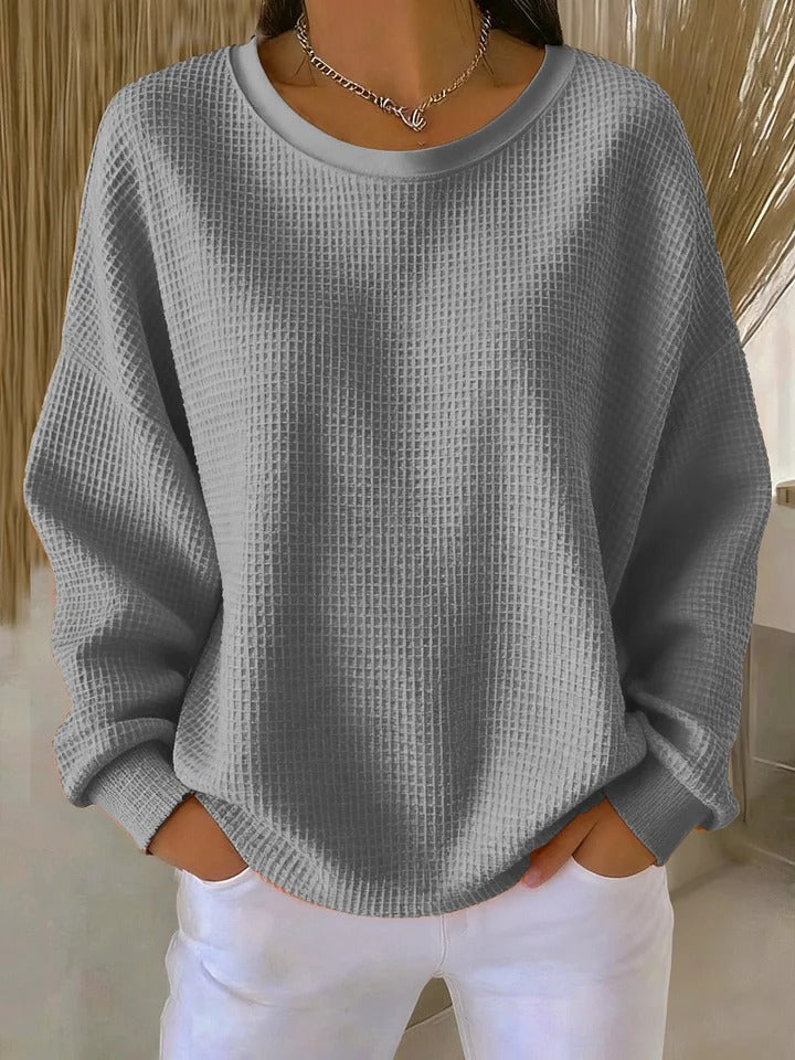Dámský svetr s texturovaným povrchem a volným střihem
